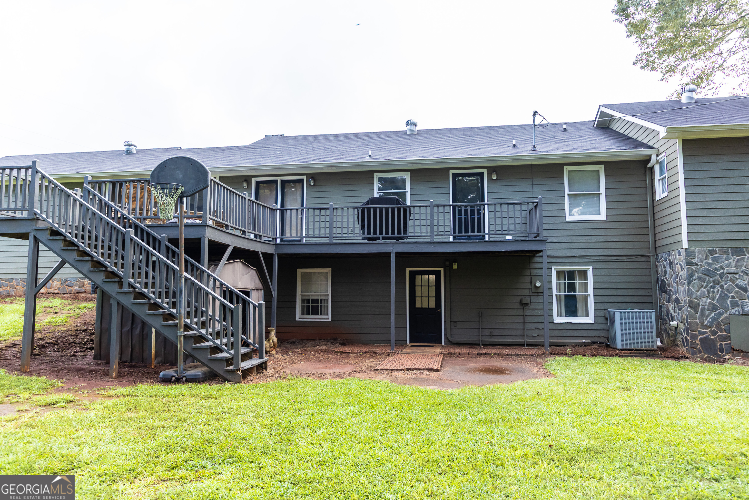 976 Windsweep Farm Road Thomaston, GA 30286 - Photo 44 of 98 a view of a house with a yard and a large tree