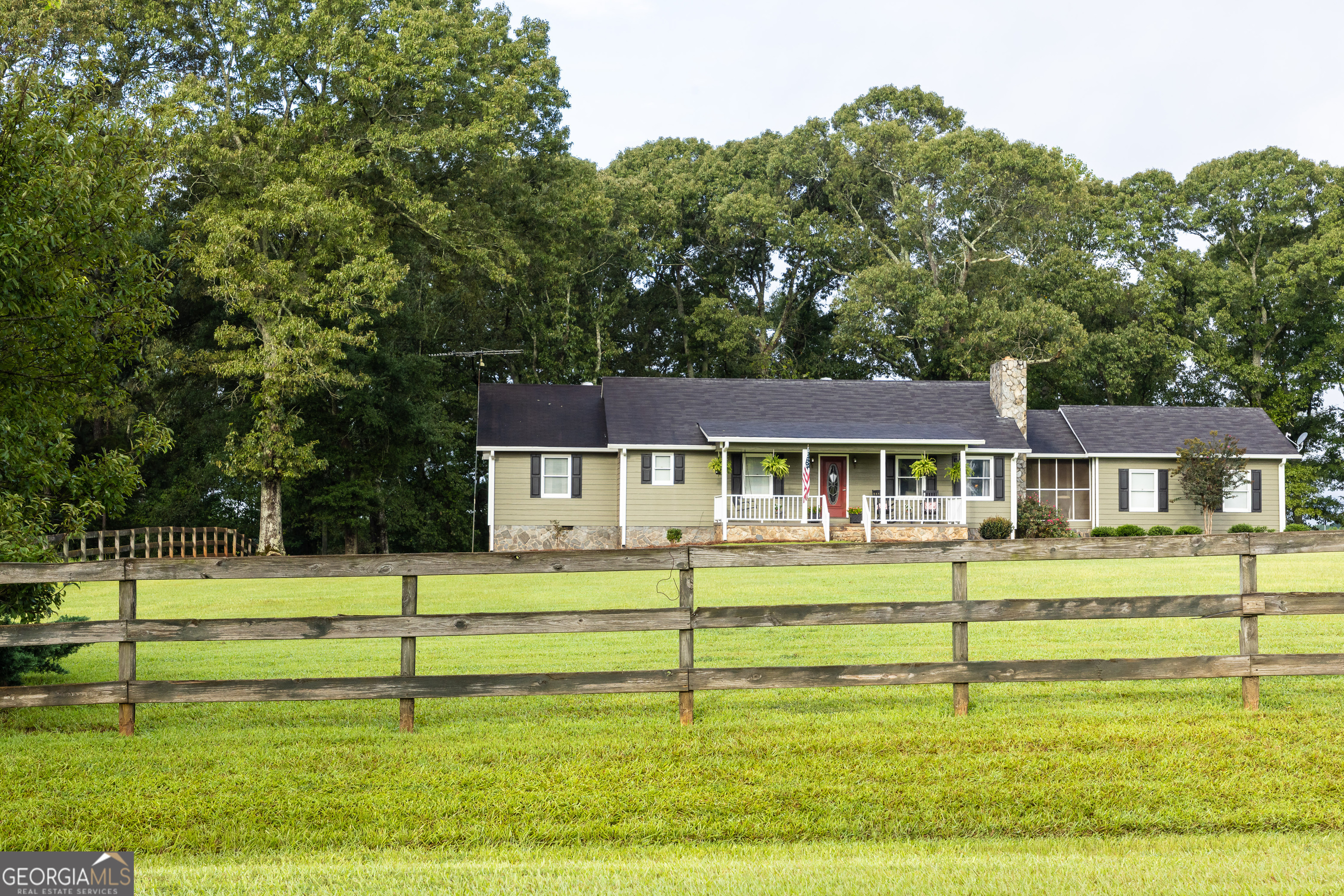 976 Windsweep Farm Road Thomaston, GA 30286 - Photo 58 of 98 a front view of a house with a yard