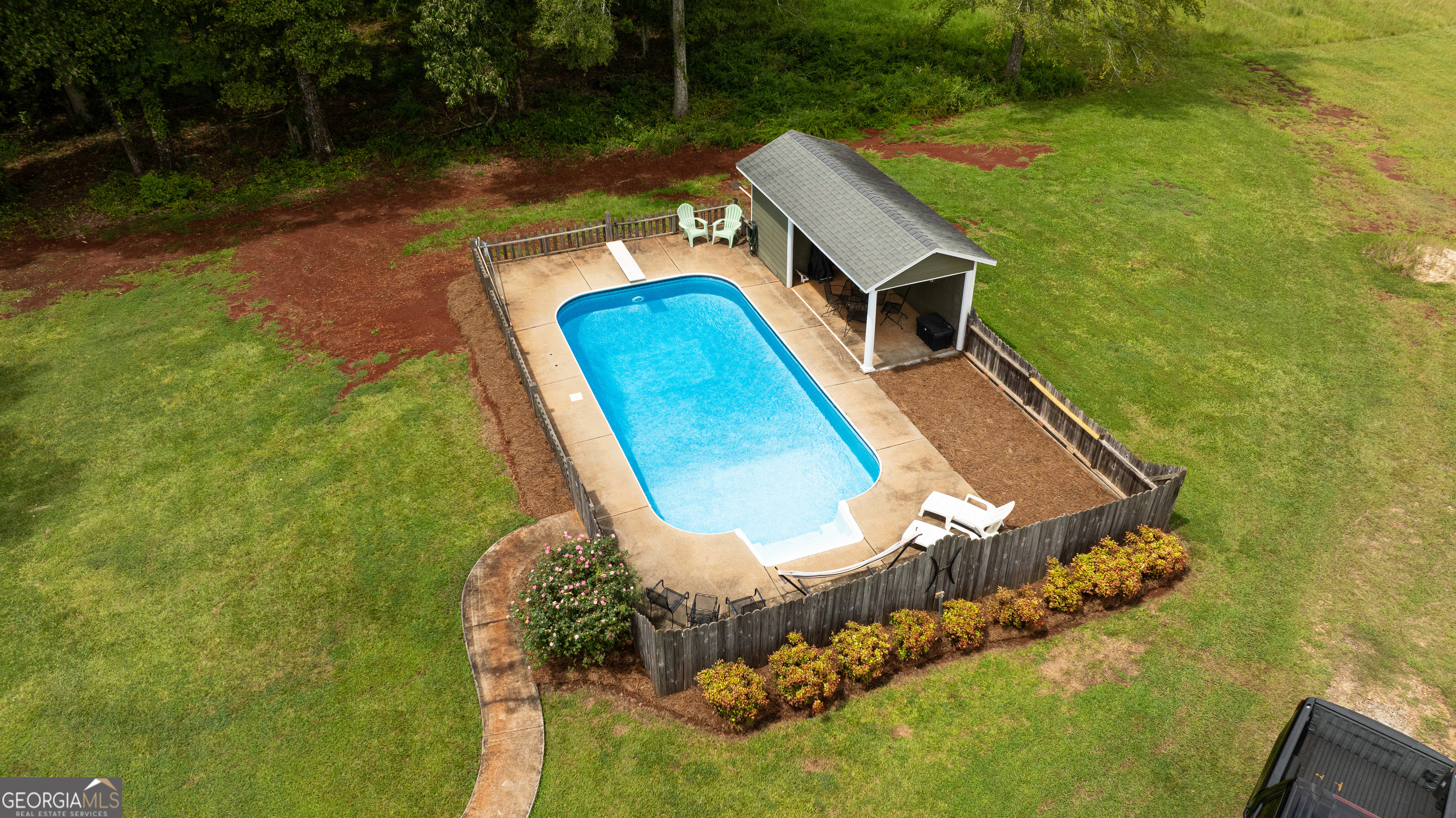 976 Windsweep Farm Road Thomaston, GA 30286 - Photo 85 of 98 a view of a swimming pool with a yard