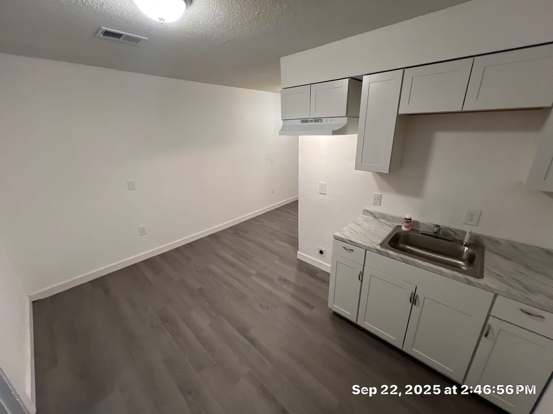 2773 Waverly Avenue Memphis, TN 38114 - Photo 14 of 20 a kitchen with a stove and a refrigerator