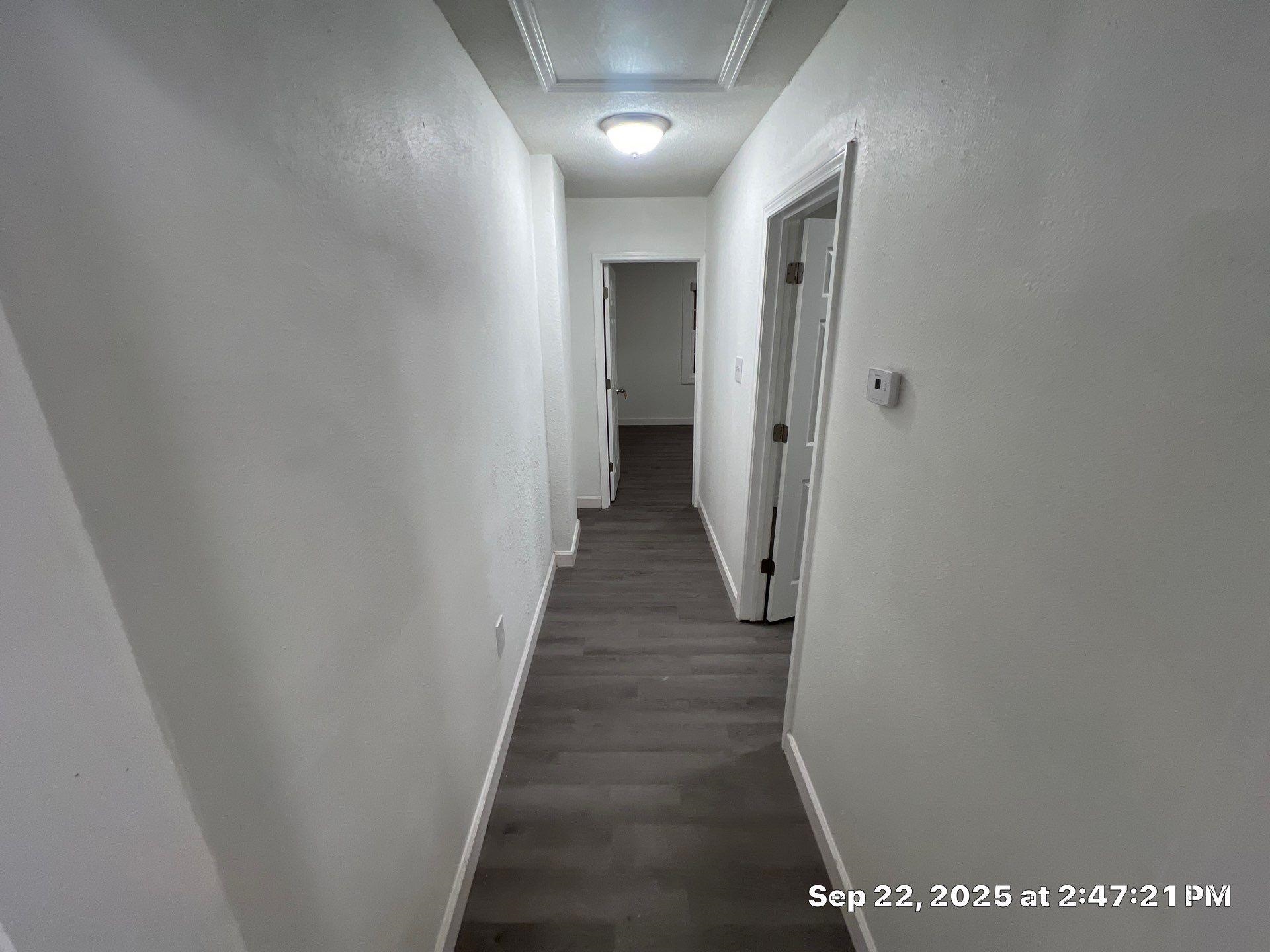 2773 Waverly Avenue Memphis, TN 38114 - Photo 17 of 20 a view of a hallway with wooden floor and entryway