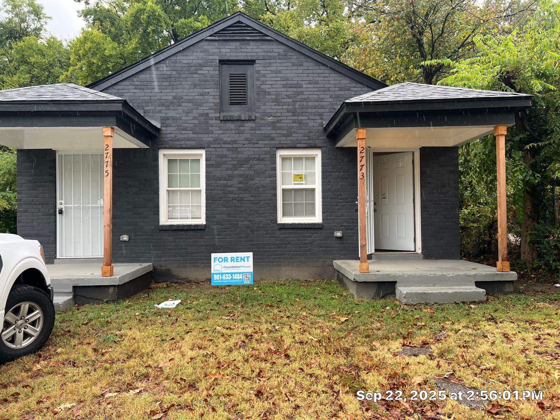 2773 Waverly Avenue Memphis, TN 38114 - Photo 20 of 20 a front view of a house with a yard