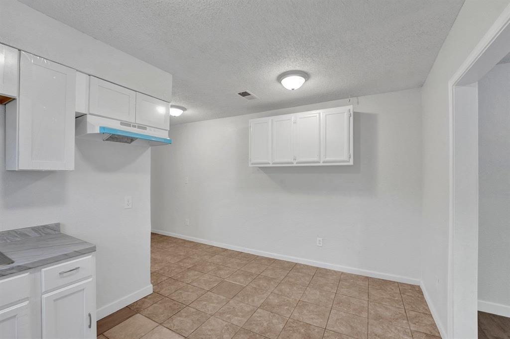 2773 Waverly Avenue Memphis, TN 38114 - Photo 6 of 20 a view of cabinets and wooden floor