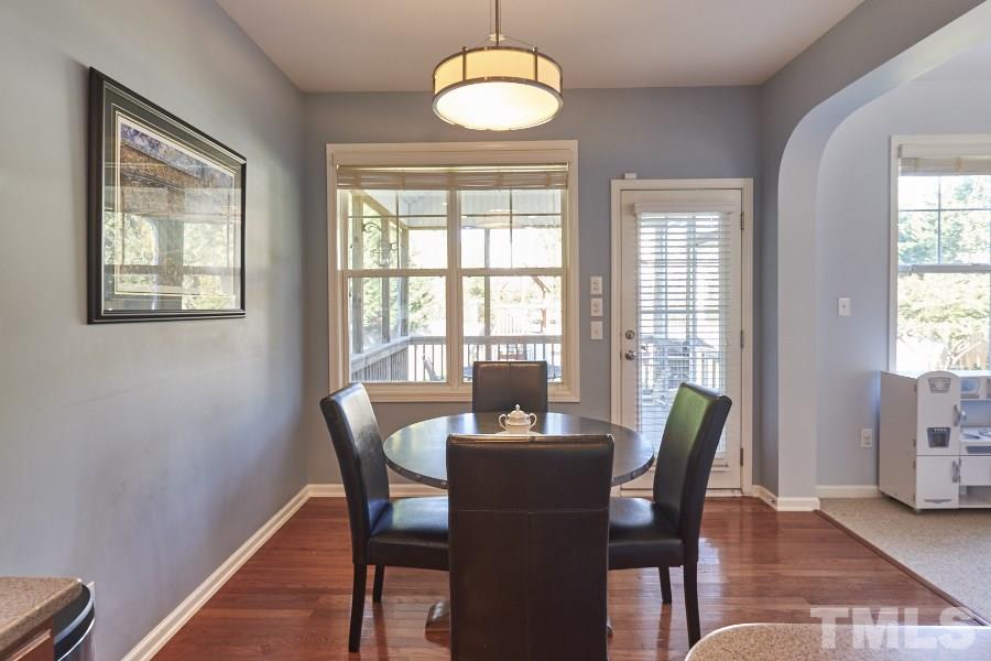8518 Eden Park Drive Raleigh, NC 27613 - Photo 14 of 25 Picturesque breakfast room overlooks screened-in porch