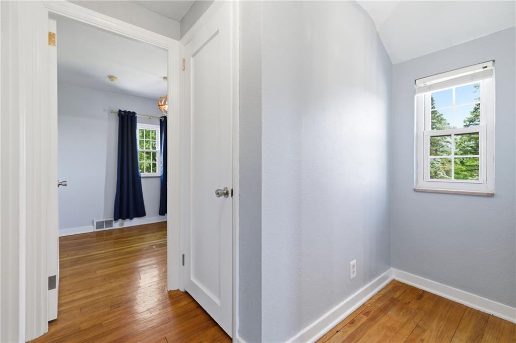 4883 East Willock Road Pittsburgh, PA 15227 - Photo 22 of 33 a view of a hallway with wooden floor and closet area