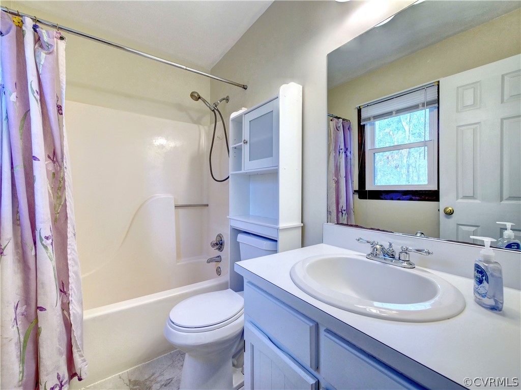 7400 Drexelbrook Road Chesterfield, VA 23832 - Photo 13 of 32 a bathroom with a sink toilet and shower