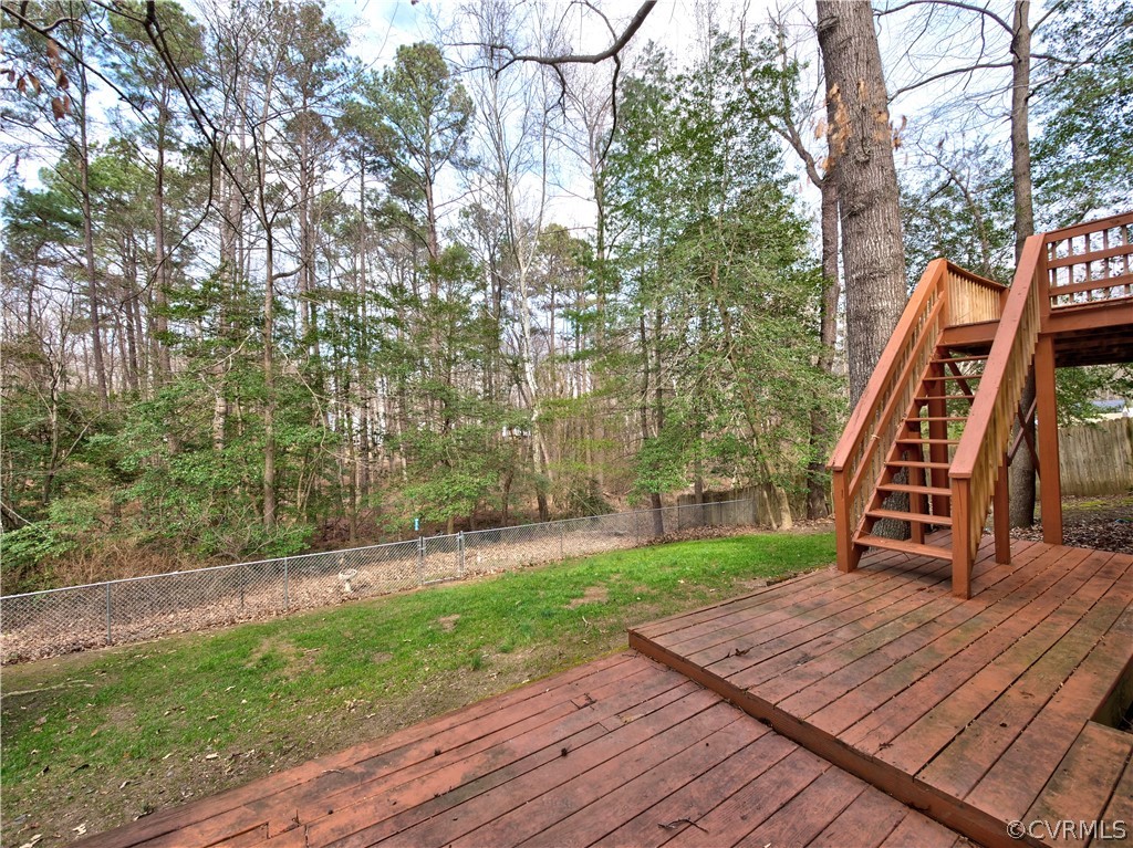 7400 Drexelbrook Road Chesterfield, VA 23832 - Photo 26 of 32 a view of a backyard with wooden floor and large trees