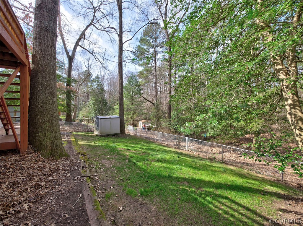 7400 Drexelbrook Road Chesterfield, VA 23832 - Photo 28 of 32 a backyard of a house with lots of green space