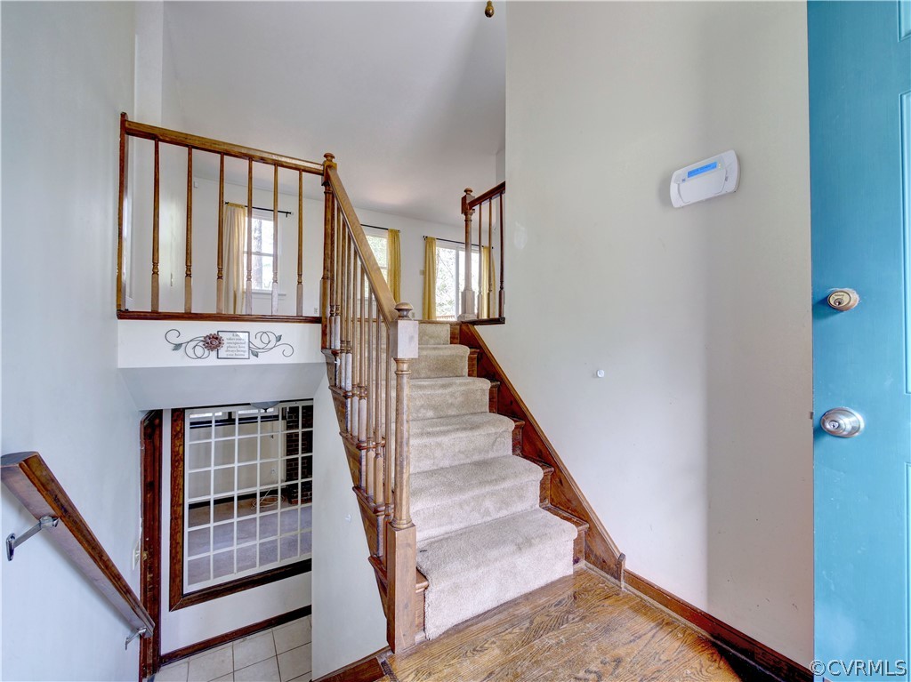 7400 Drexelbrook Road Chesterfield, VA 23832 - Photo 3 of 32 a view of an entryway with wooden floor and livingroom