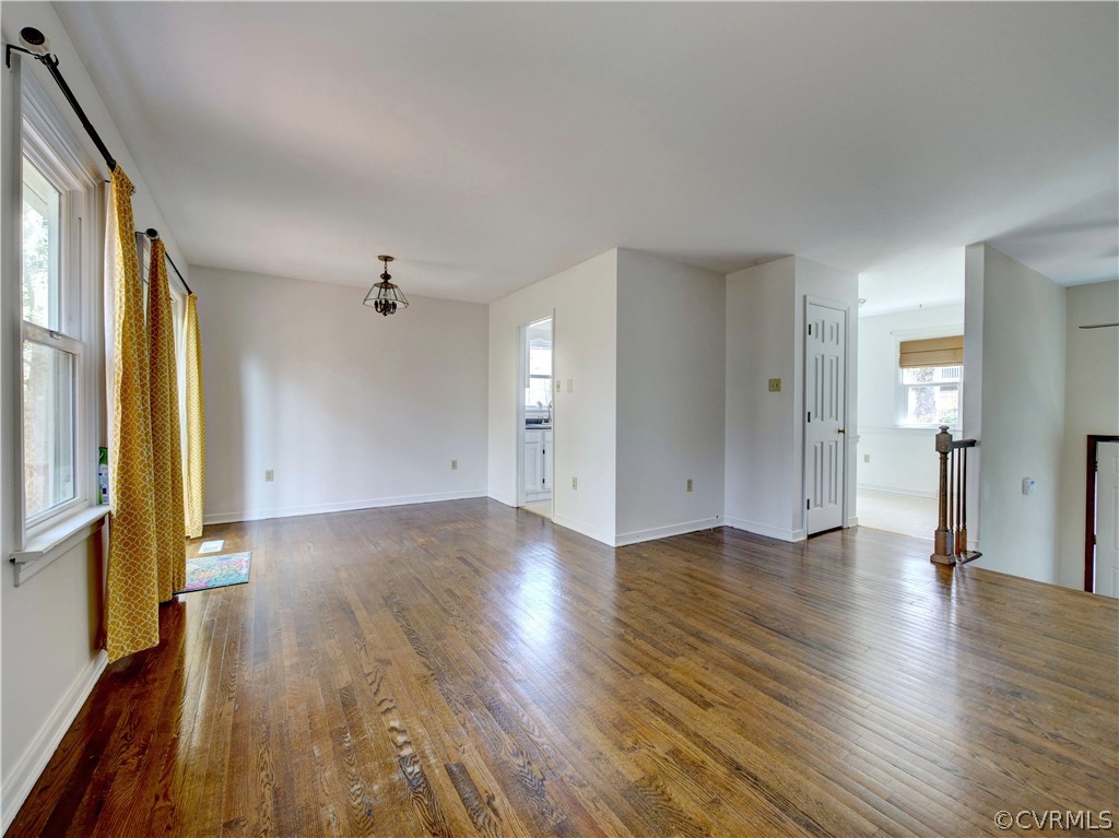 7400 Drexelbrook Road Chesterfield, VA 23832 - Photo 5 of 32 an empty room with wooden floor and windows