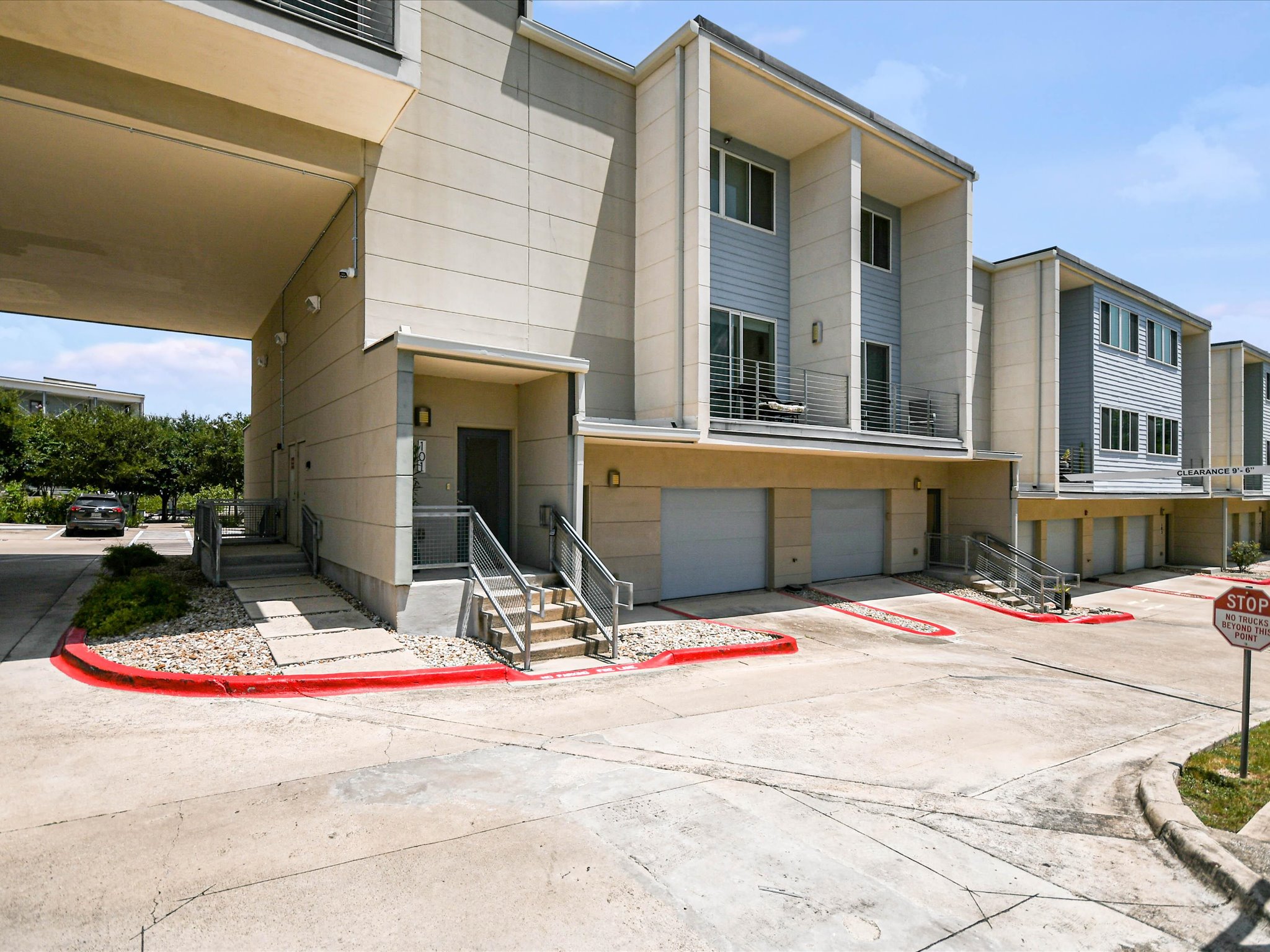 604 North Bluff Drive, Unit 101 Austin, TX 78745 - Photo 4 of 22 View of front of home featuring a garage
