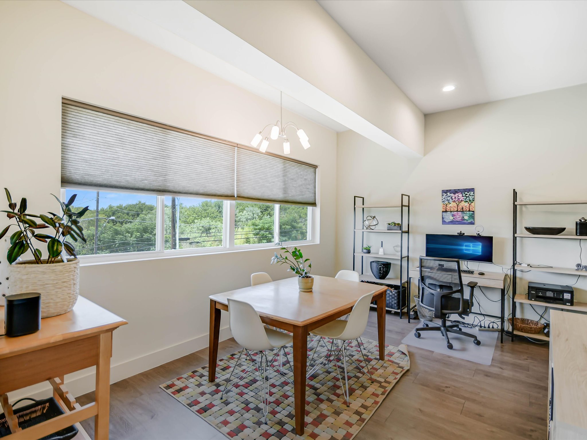 604 North Bluff Drive, Unit 101 Austin, TX 78745 - Photo 9 of 22 Office space with a chandelier, light wood-style floors, and recessed lighting