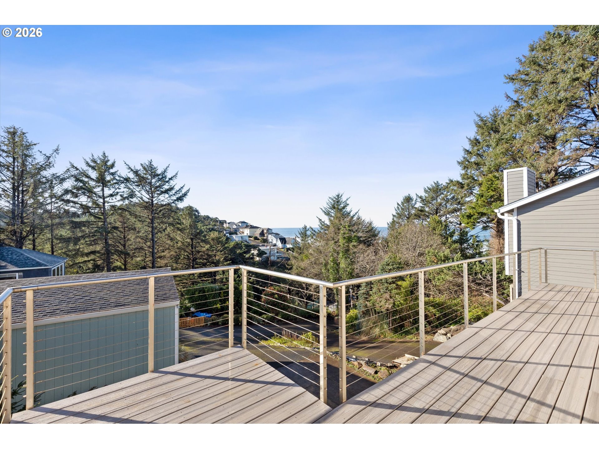 860 Southwest 10th Street Lincoln City, OR 97367 - Photo 40 of 45 a view of balcony with wooden floor and fence