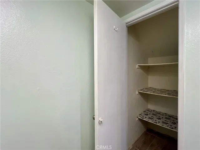 a wooden floor in a gallery