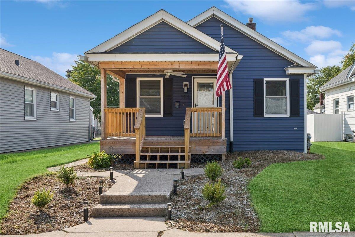 1911 23rd Street, Unit A Moline, IL 61265 - Photo 1 of 28 a front view of a house with garden
