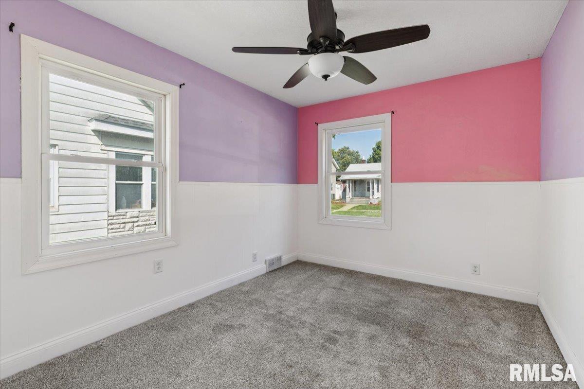 1911 23rd Street, Unit A Moline, IL 61265 - Photo 18 of 28 a view of empty room with window