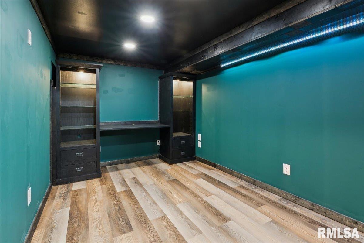 1911 23rd Street, Unit A Moline, IL 61265 - Photo 23 of 28 a bedroom with a bed and a dresser