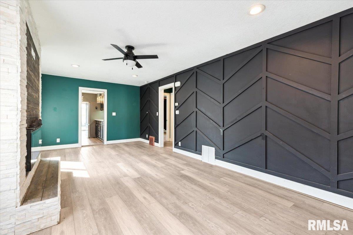 1911 23rd Street, Unit A Moline, IL 61265 - Photo 8 of 28 a view of a house with a ceiling fan