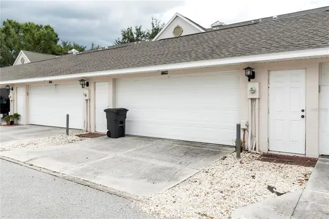 a view of a front door and a yard