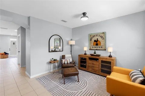 a living room with furniture and a couch