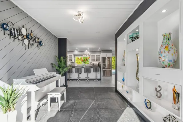 a view of an entryway with furniture and livingroom view