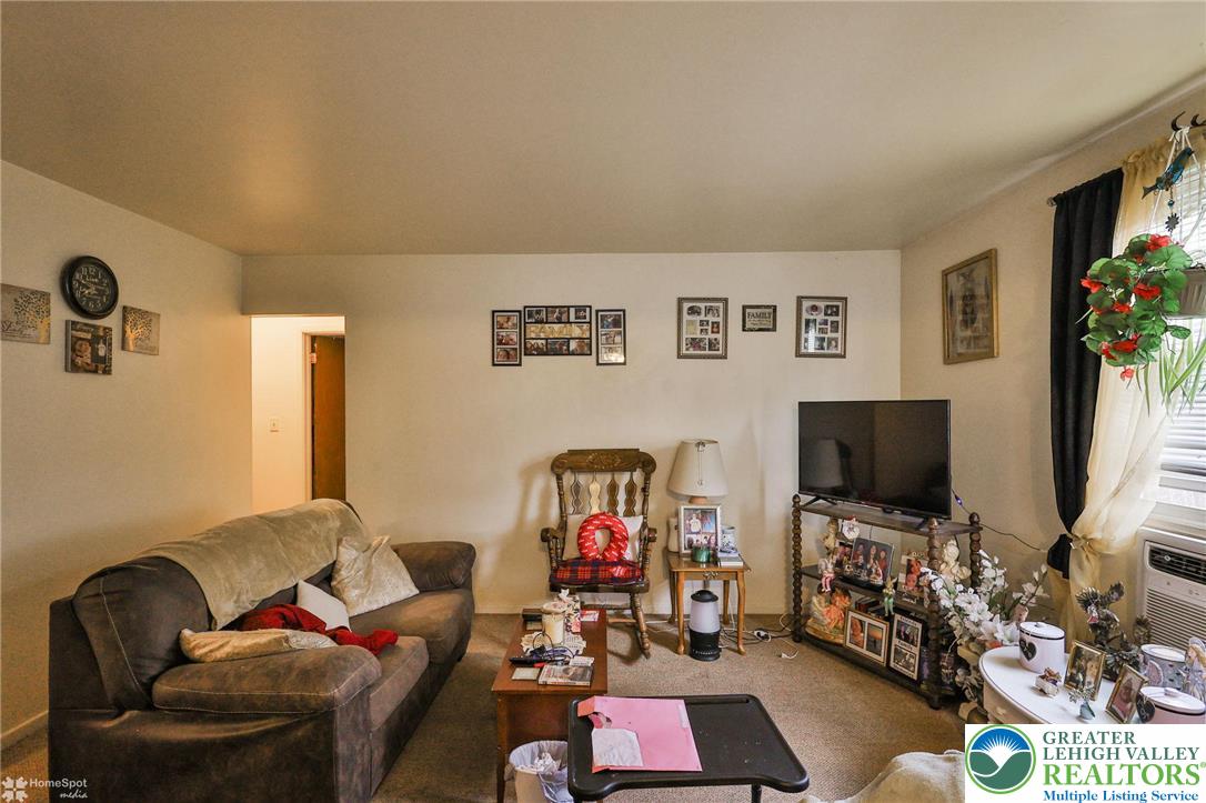 802 West Berwick Street Easton, PA 18042 - Photo 17 of 54 a living room with furniture and a flat screen tv