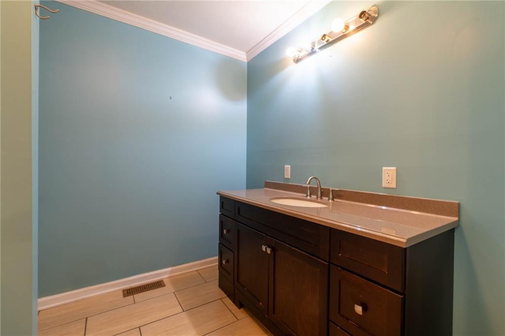 1509 Jefferson Road Jefferson, PA 15344 - Photo 12 of 29 a room with a sink and vanity