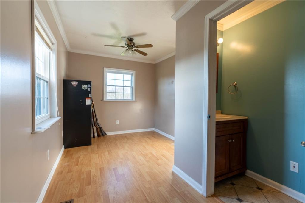 1509 Jefferson Road Jefferson, PA 15344 - Photo 15 of 29 wooden floor in an empty room with a window