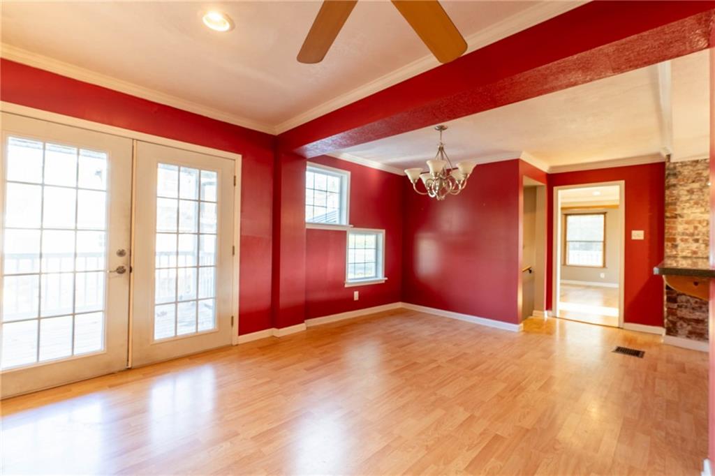 1509 Jefferson Road Jefferson, PA 15344 - Photo 8 of 29 a view of an empty room with window and wooden floor