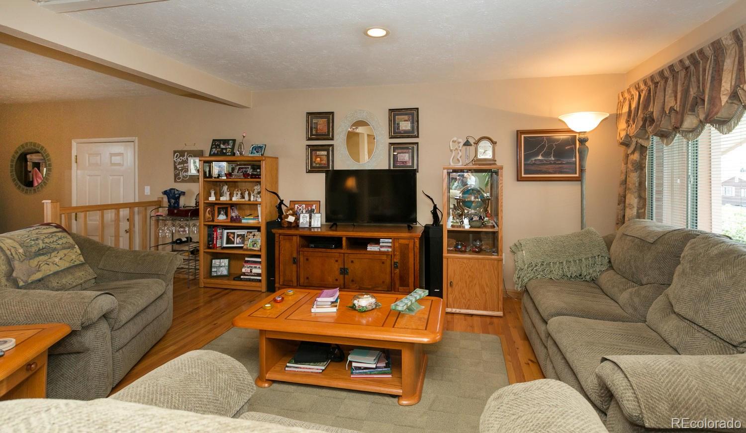 5110 Simms Place Wheat Ridge, CO 80033 - Photo 4 of 35 Gallery Image 4