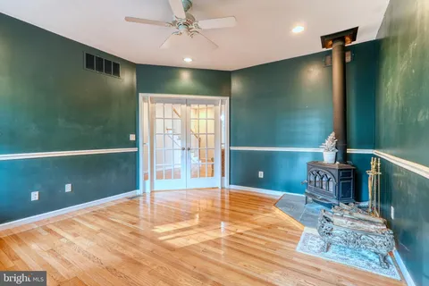 a view of an empty room with a bathroom