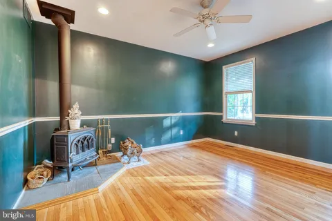 a bed room with a bed and a chandelier
