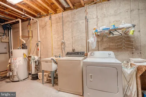 a storage room with washer and dryer