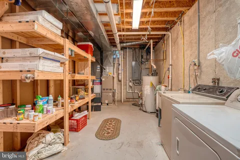 a bed room with a bed and a chandelier