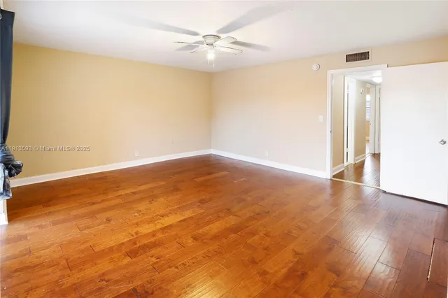 a view of cabinet with mirror