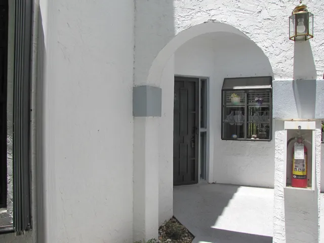 a view of a hallway with entryway