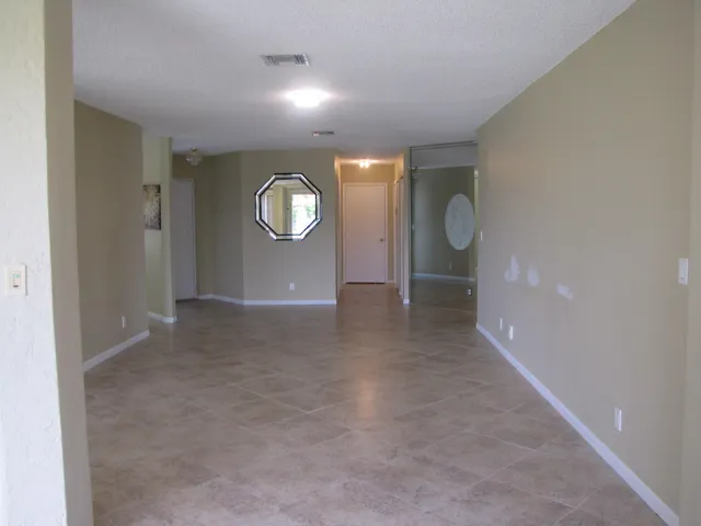 a view of a hallway with entryway
