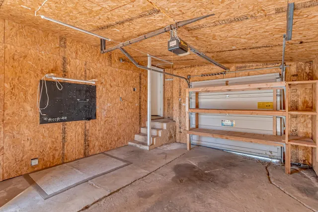 an aerial view of houses with outdoor space
