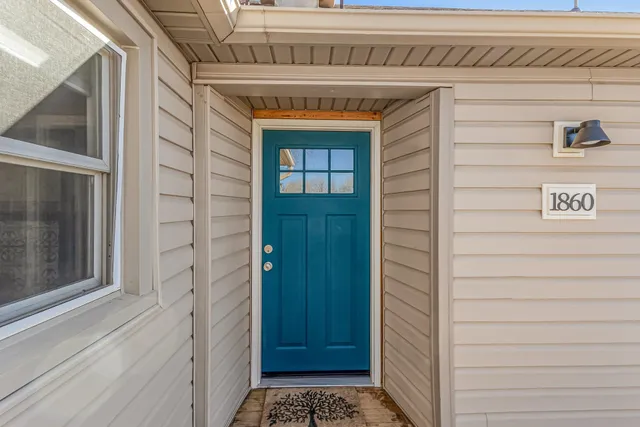 a view of room with window and cabinet