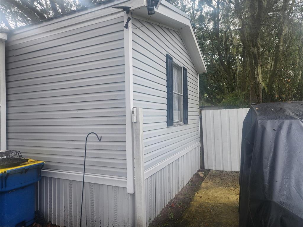 13712 Coman Road Jacksonville, FL 32218 - Photo 4 of 16 a view of a house with a backyard