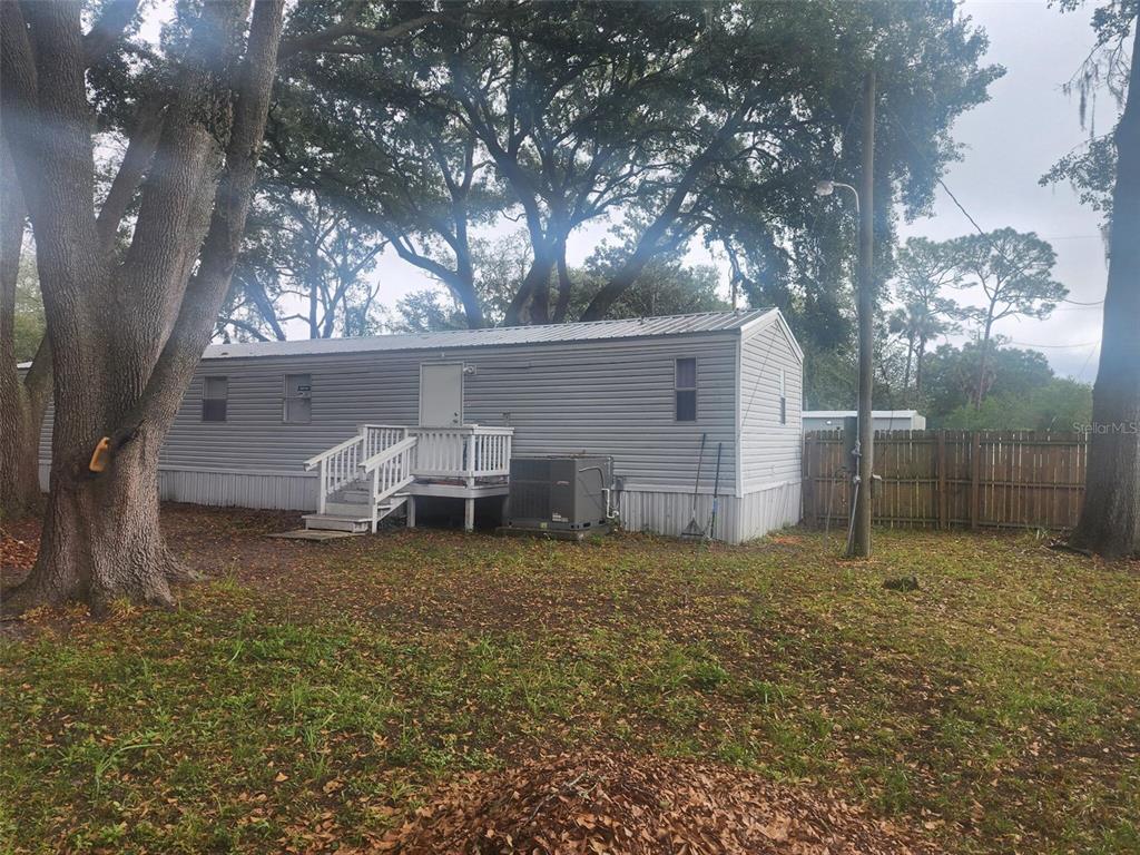 13712 Coman Road Jacksonville, FL 32218 - Photo 7 of 16 a view of a backyard