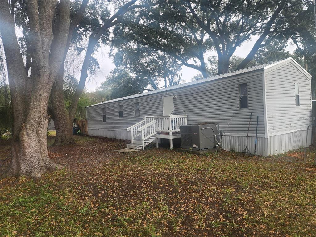 13712 Coman Road Jacksonville, FL 32218 - Photo 10 of 16 a view of a house with backyard