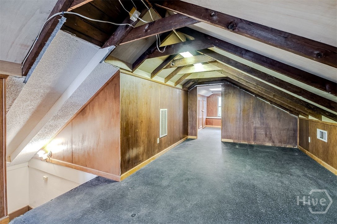 514 Maupas Avenue Savannah, GA 31401 - Photo 46 of 53 The attic work out room is spacious