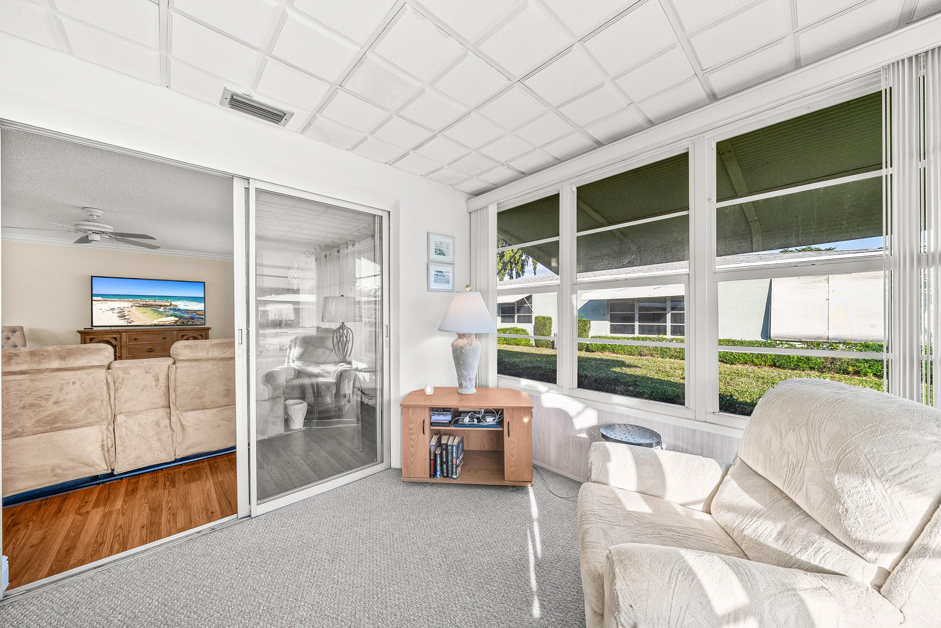 175 High Point Terrace East, Unit D Delray Beach, FL 33445 - Photo 14 of 21 Enclosed Florida Room