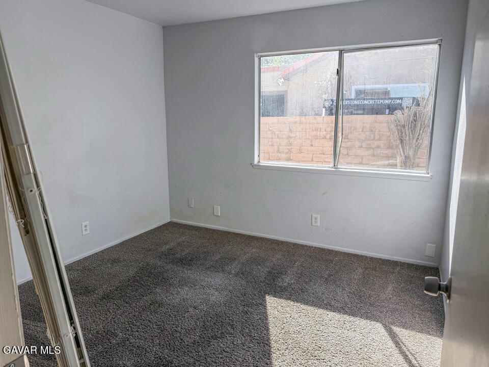 1253 Morven Street Lancaster, CA 93535 - Photo 13 of 18 an empty room with a window