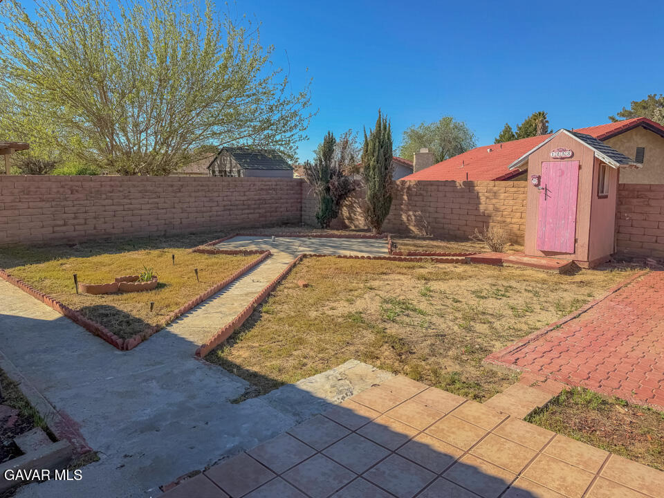 1253 Morven Street Lancaster, CA 93535 - Photo 17 of 18 a view of swimming pool with outdoor seating