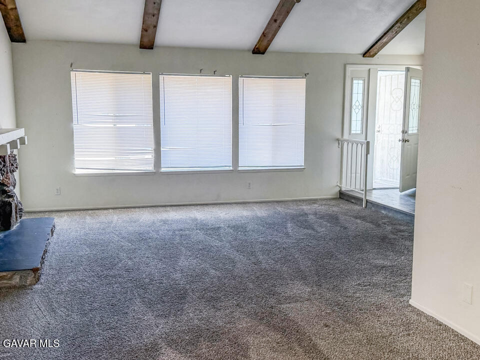 1253 Morven Street Lancaster, CA 93535 - Photo 2 of 18 an empty room with windows