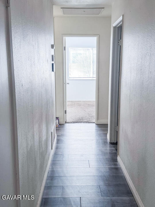 1253 Morven Street Lancaster, CA 93535 - Photo 7 of 18 a view of a hallway with wooden floor