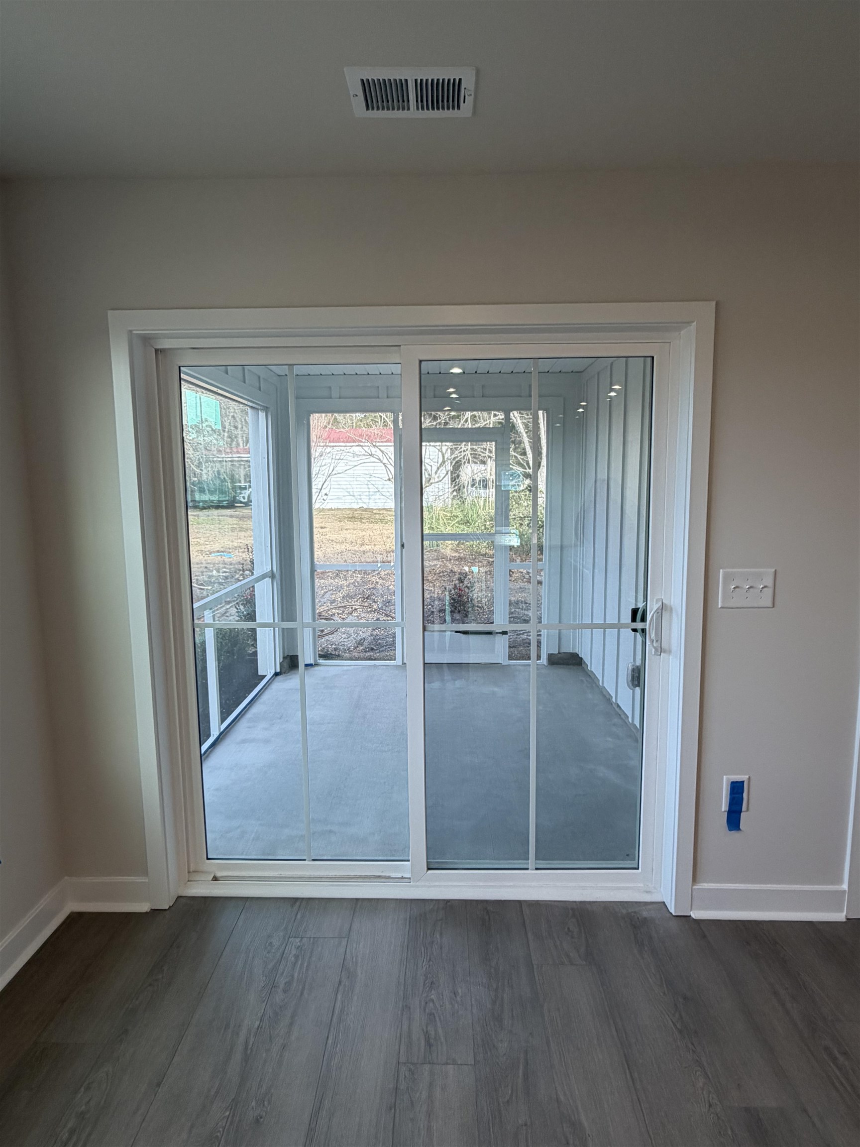 1311 Pleasant View Drive, Unit F North Myrtle Beach, SC 29582 - Photo 12 of 13 Entryway with plenty of natural light and wood finished floors