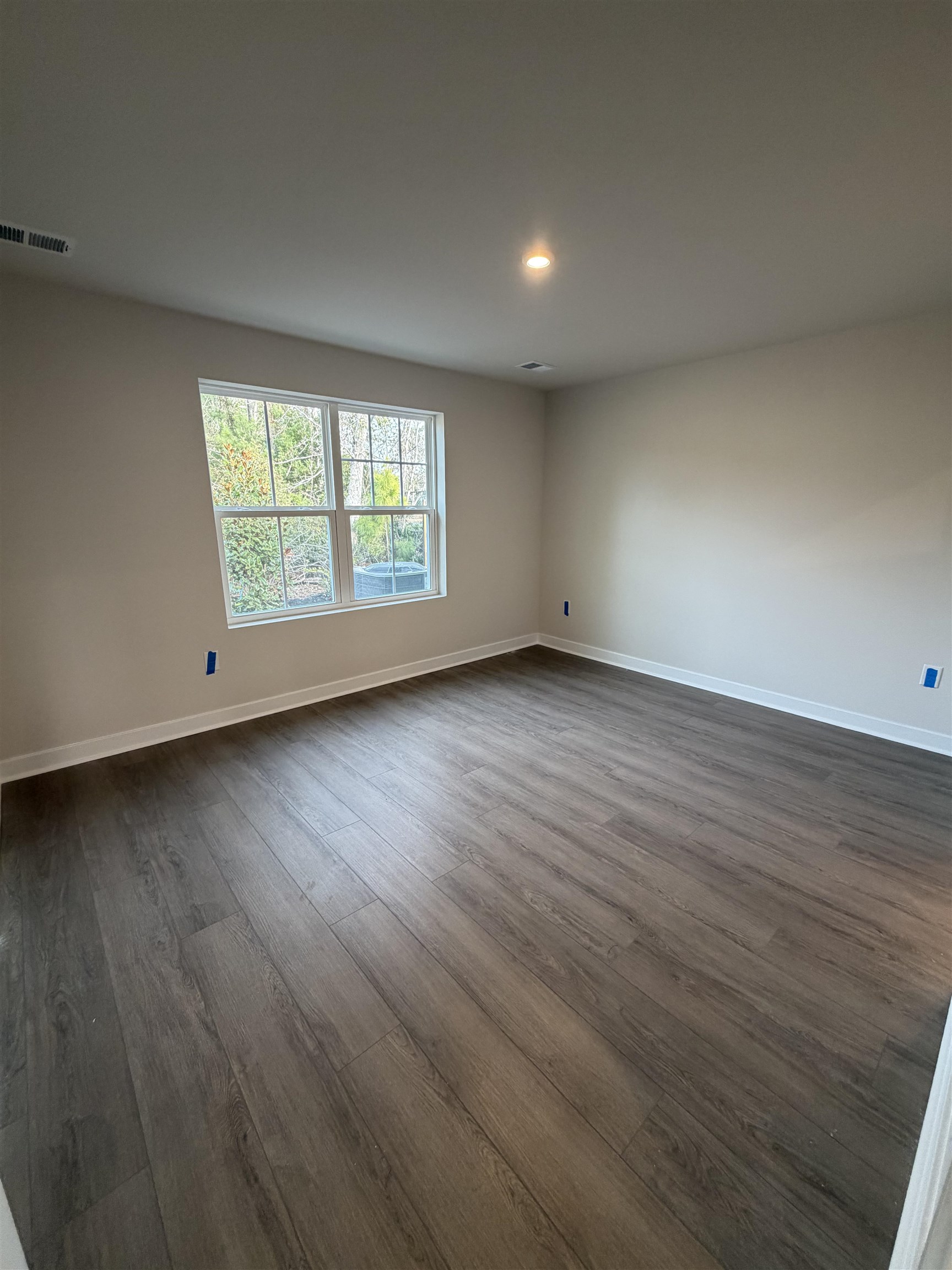 1311 Pleasant View Drive, Unit F North Myrtle Beach, SC 29582 - Photo 4 of 13 Empty room with dark wood-style floors and recessed lighting